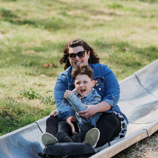 Mother and Son on toboggan at Robin Hill Adventure Park